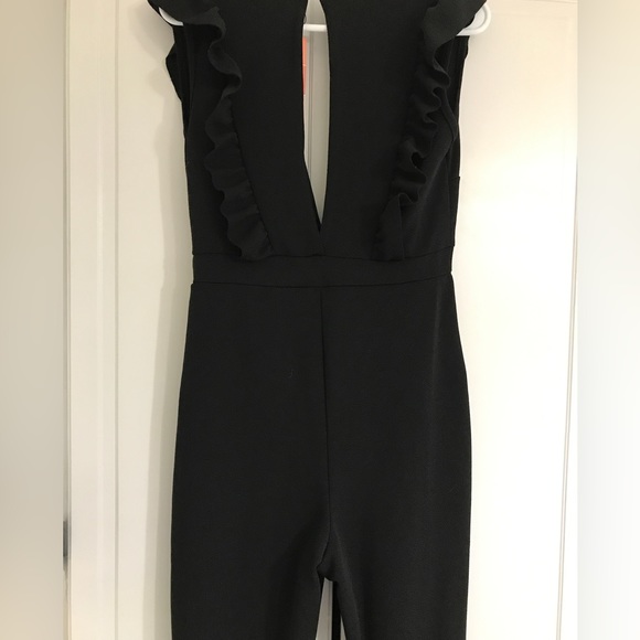 Ruffle Plunge One-Piece Jumpsuit - Picture 5 of 10